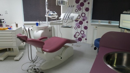 1. A dental hygienist surgery with dental chair