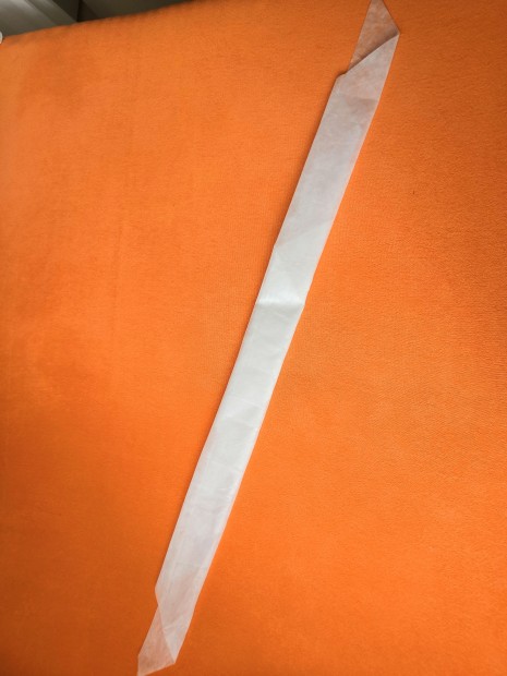 8. Složení trojcípého šátku do kravaty