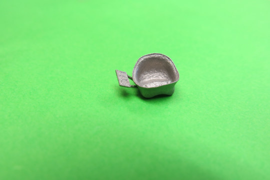 1. Kovová konstrukce metalokeramické korunky zhotovená metodou CAD/CAM – sintrováním